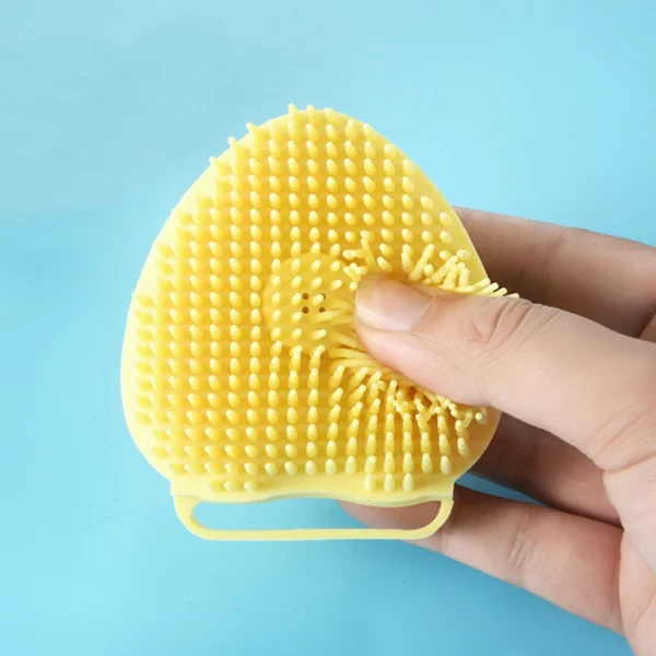 Yellow silicone bath brush and massager for dogs